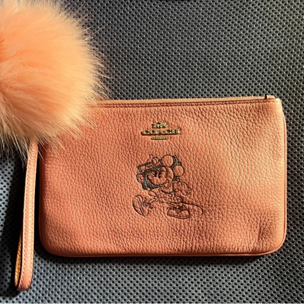 Minnie Mouse coach wristlet ( gently preloved )